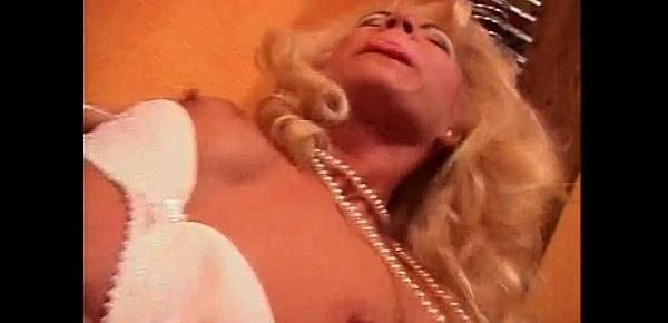  Wonderful blonde milf has a special gift for you!